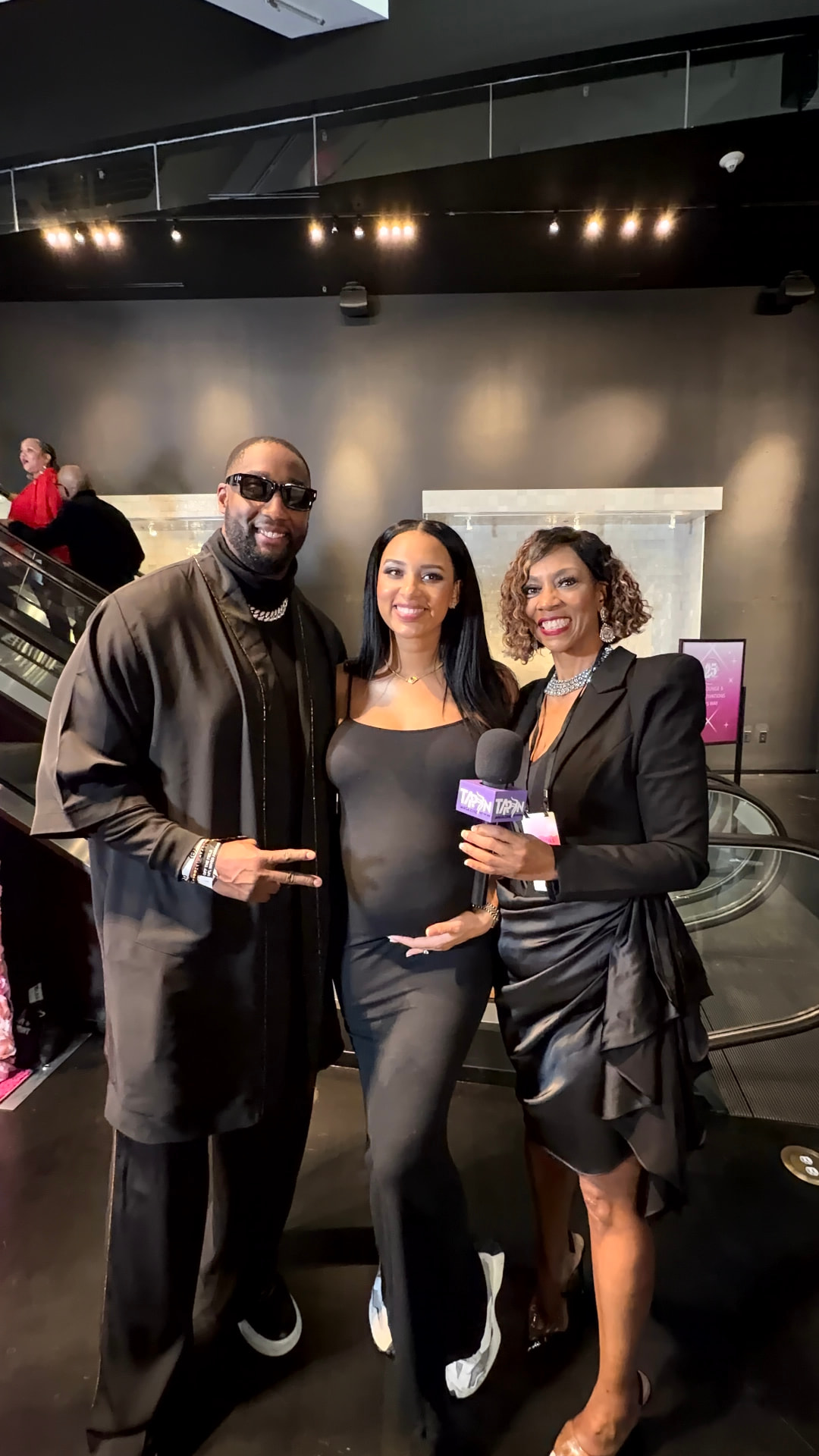 Dr. Tandra Price with a Tap-In Magazine interview guest — original photograph 1